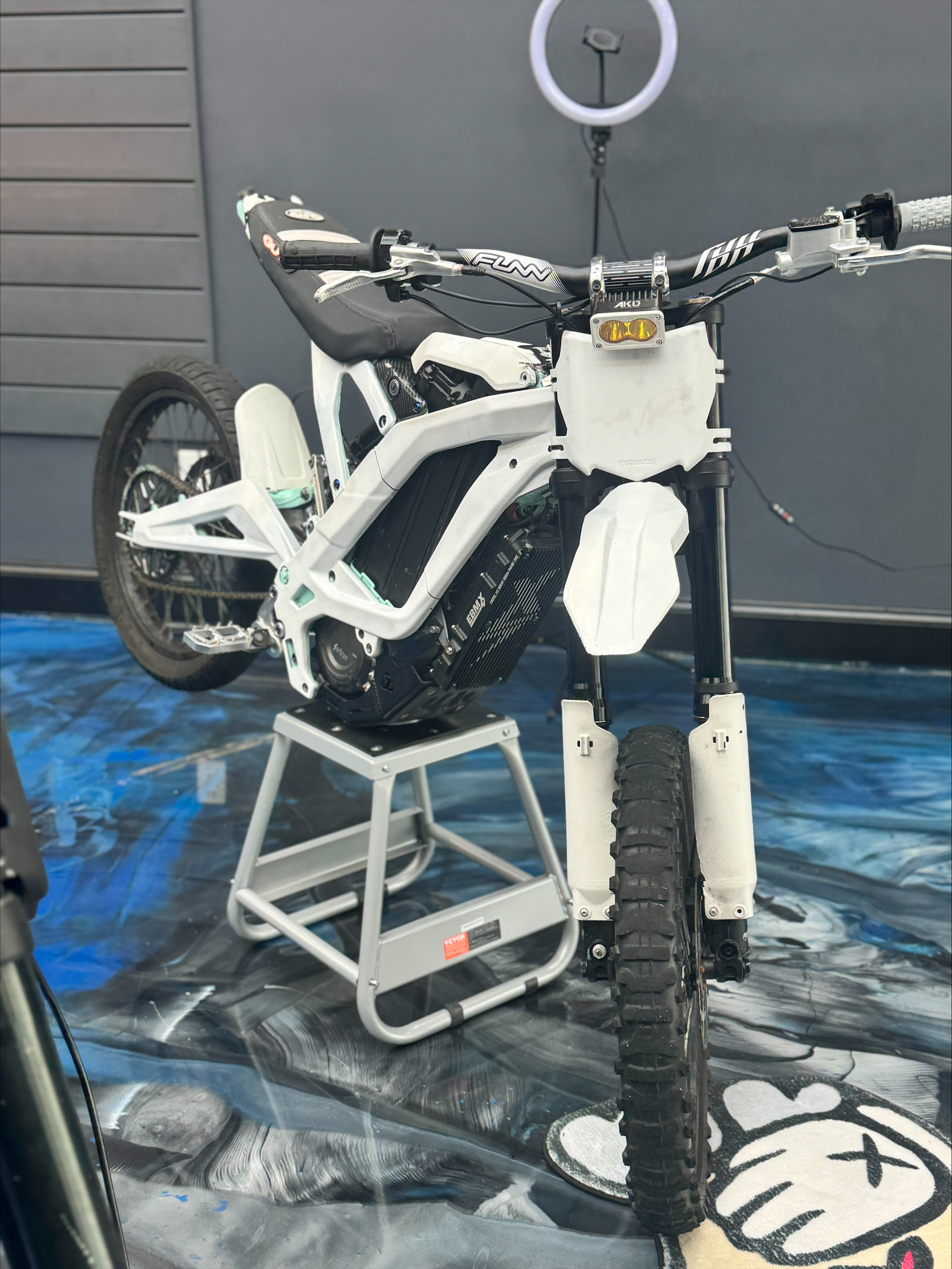 White SoFlo E-Moto bike staged on the shop floor after inspection