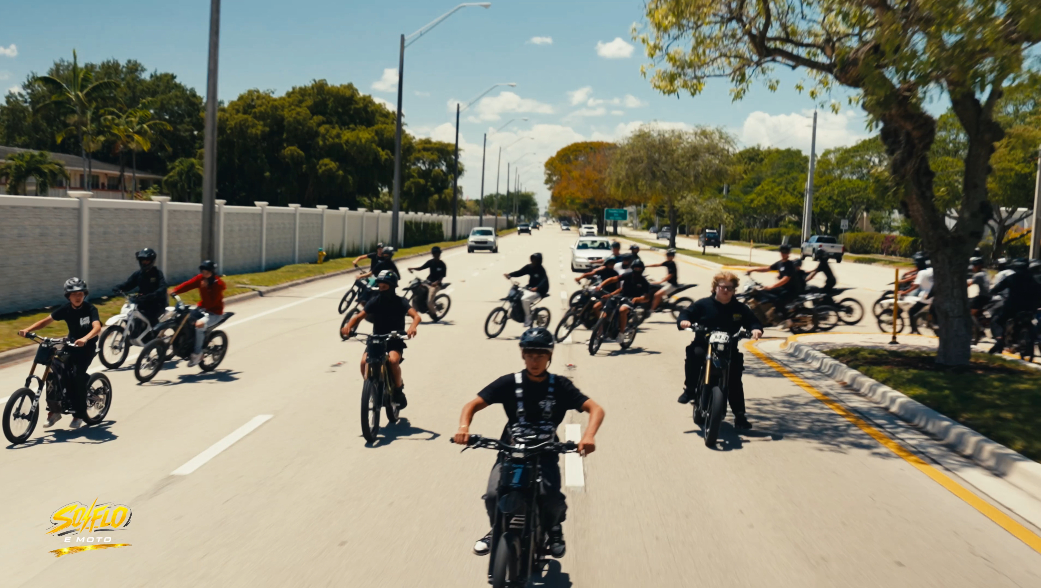 SoFlo E-Moto rideout filling the street at night